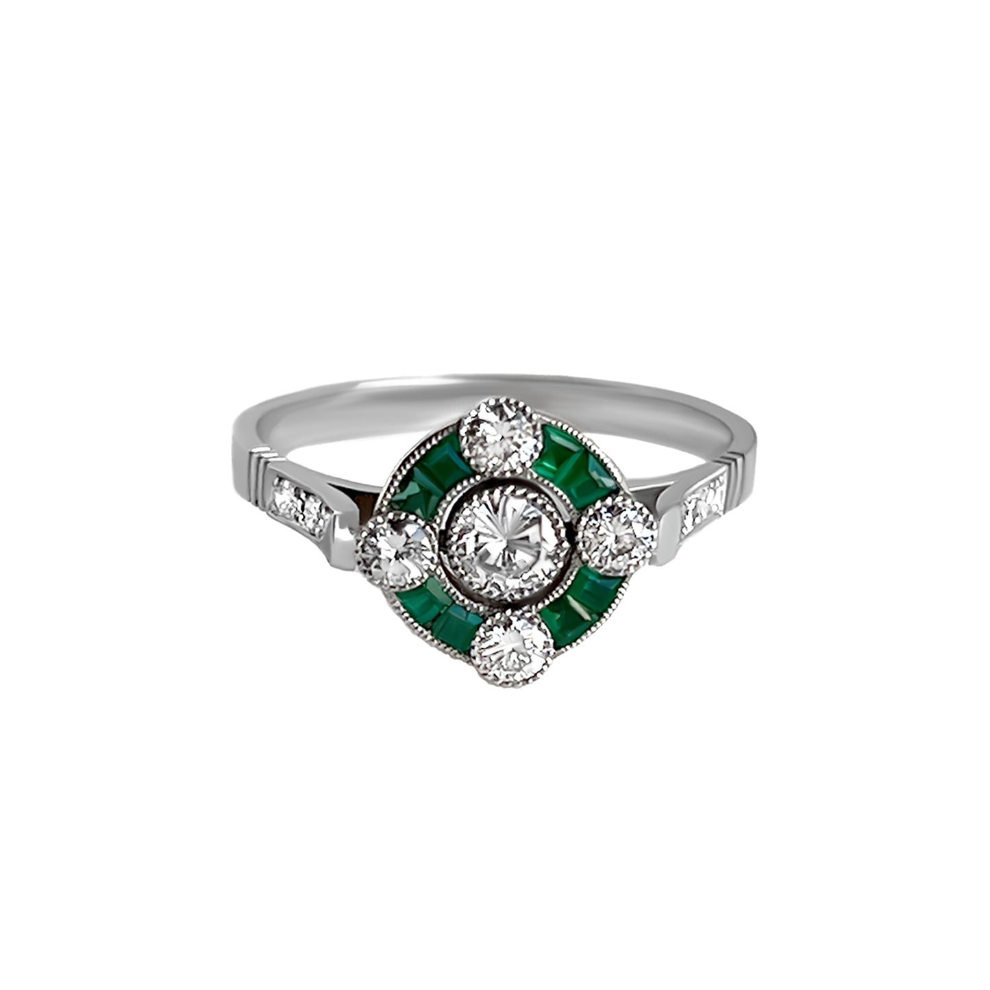 Anillo partridge eye en oro blanco con diamantes y esmeraldas